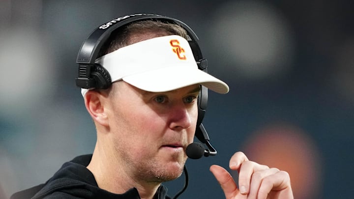 Dec 27, 2024; Las Vegas, NV, USA; Southern California Trojans head coach Lincoln Riley reacts against the Texas A&M Aggies in the second half at Allegiant Stadium. Mandatory Credit: Kirby Lee-Imagn Images Dec 27, 2024; Las Vegas, NV, USA; Southern California Trojans head coach Lincoln Riley reacts against the Texas A&M Aggies in the second half at Allegiant Stadium. Mandatory Credit: Kirby Lee-Imagn Images