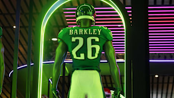 Feb 4, 2025; New Orleans, LA, USA; A Nike football display featuring the uniform and helmet of Philadelphia Eagles running back Saquon Barkley (26) at the NFL Shop at the Super Bowl LIX Experience at the Ernest N. Morial Convention Center. Mandatory Credit: Kirby Lee-Imagn Images