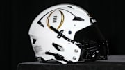 A College Football Playoff logo helmet at a press conference at The Westin Peachtree Plaza, Savannah Ballroom. Mandatory Credit: Kirby Lee-Imagn Images