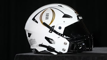 A College Football Playoff logo helmet at a press conference at The Westin Peachtree Plaza, Savannah Ballroom. Mandatory Credit: Kirby Lee-Imagn Images