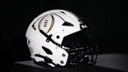 Jan 19, 2025; Atlanta, GA, USA; A College Football Playoff logo helmet at a press conference at The Westin Peachtree Plaza, Savannah Ballroom. Mandatory Credit: Kirby Lee-Imagn Images