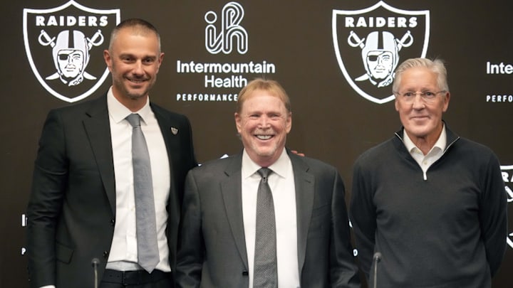 Las Vegas Raiders general manager John Spytek, owner Mark Davis and coach Pete Carroll pose at press conference