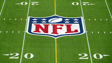 Feb 1, 2025; Orlando, FL, USA; An overall view of the NFL shield logo at midfield on the Camping World Stadium flag football field. Mandatory Credit: Kirby Lee-Imagn Images