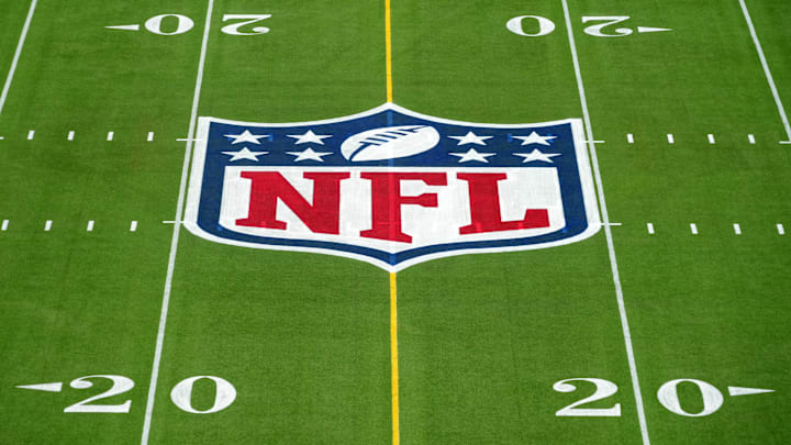 Feb 1, 2025; Orlando, FL, USA; An overall view of the NFL shield logo at midfield on the Camping World Stadium flag football field. Mandatory Credit: Kirby Lee-Imagn Images