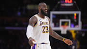 Dec 15, 2024; Los Angeles, California, USA; Los Angeles Lakers forward LeBron James (23) reacts in the first half against the Memphis Grizzlies at Crypto.com Arena. Mandatory Credit: Kirby Lee-Imagn Images
