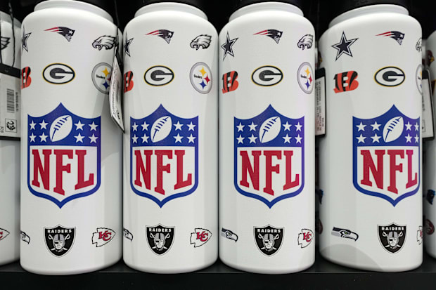 NFL shield logo water bottles at the NFL Shop at the Super Bowl LIX Experience at the Ernest N. Morial Convention Center.