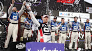 Oct 26, 2025; Martinsville, Virginia, USA; NASCAR Cup Series driver William Byron (24) celebrates his win following the Xfinity 500 at Martinsville Speedway.