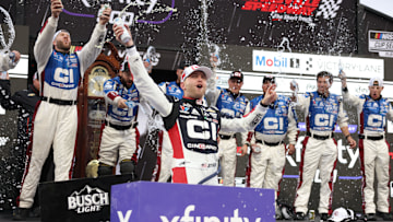 Oct 26, 2025; Martinsville, Virginia, USA; NASCAR Cup Series driver William Byron (24) celebrates his win following the Xfinity 500 at Martinsville Speedway.
