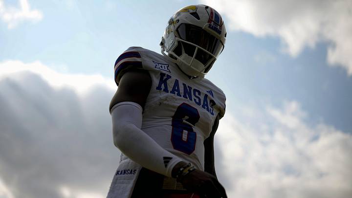 Sep 6, 2025; Columbia, Missouri, USA; Kansas Jayhawks quarterback Jalon Daniels (6) walks off the field during the first half against the Missouri Tigers at Faurot Field at Memorial Stadium. Mandatory Credit: Jay Biggerstaff-Imagn Images