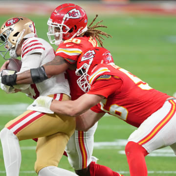 Feb 11, 2024; Paradise, Nevada, USA; Kansas City Chiefs safety Justin Reid (20) and defensive end George Karlaftis (56) tackle San Francisco 49ers quarterback Brock Purdy (13) during the second quarter of Super Bowl LVIII at Allegiant Stadium. Mandatory Credit: Kyle Terada-USA TODAY Sports