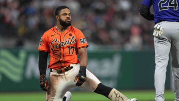 Jul 26, 2024; San Francisco, California, USA;  San Francisco Giants outfielder Heliot Ramos (17) reacts at third base after hitting a triple during the third inning against the Colorado Rockies at Oracle Park. 