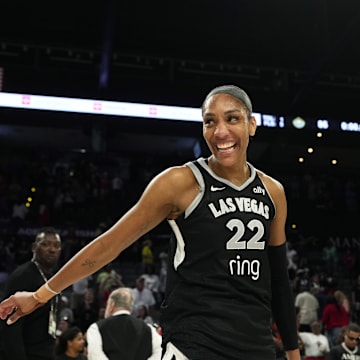 Aug 8, 2025; Las Vegas, Nevada, USA; Las Vegas Aces center A'ja Wilson (22) reacts after an WNBA basketball game against the Seattle Storm at Michelob Ultra Arena. Mandatory Credit: Lucas Peltier-Imagn Images