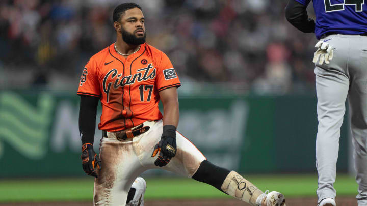 Jul 26, 2024; San Francisco, California, USA;  San Francisco Giants outfielder Heliot Ramos (17) reacts at third base after hitting a triple during the third inning against the Colorado Rockies at Oracle Park.