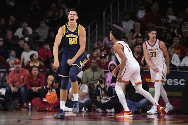 Michigan Wolverines center Vladislav Goldin (50) celebrates in the second half against the Southern California Trojans.