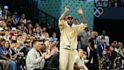 Aug 10, 2024; Paris, France; Carmelo Anthony cheers in the second half against France in the men's basketball gold medal game during the Paris 2024 Olympic Summer Games at Accor Arena. Mandatory Credit: Rob Schumacher-Imagn Images