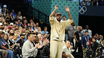 Aug 10, 2024; Paris, France; Carmelo Anthony cheers in the second half against France in the men's basketball gold medal game during the Paris 2024 Olympic Summer Games at Accor Arena. Mandatory Credit: Rob Schumacher-Imagn Images