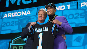 Apr 24, 2025; Green Bay, WI, USA; NFL commissioner Roger Goodell with Arizona Wildcats wide receiver Tetairoa McMillan after he is selected by the Carolina Panthers as the number eight pick  in the first round of the 2025 NFL Draft at Lambeau Field. Mandatory Credit: Kirby Lee-Imagn Images