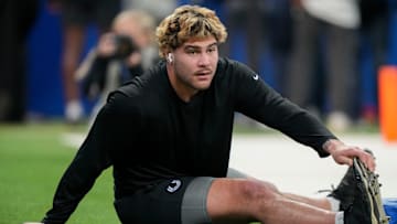 Indianapolis Colts defensive end Laiatu Latu (97) warms up before a game against the Detroit Lions on Sunday, Nov. 24, 2024, at Lucas Oil Stadium in Indianapolis.