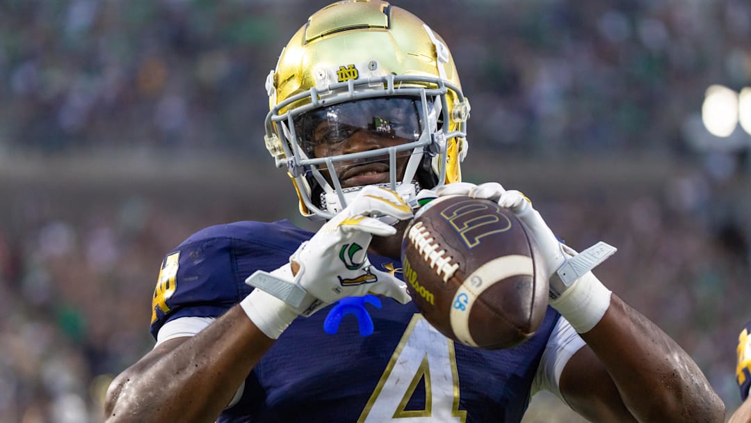 Sep 20, 2025; South Bend, Indiana, USA; Notre Dame Fighting Irish running back Jeremiyah Love (4) celebrates scoring against the Purdue Boilermakers in the second half at Notre Dame Stadium. Mandatory Credit: Michael Caterina-Imagn Images