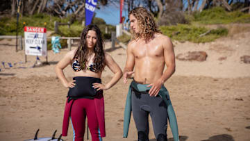 (L to R) Sky Katz as Summer Torres and Kai Lewins as Ari Gibson in Surviving Summer season 2