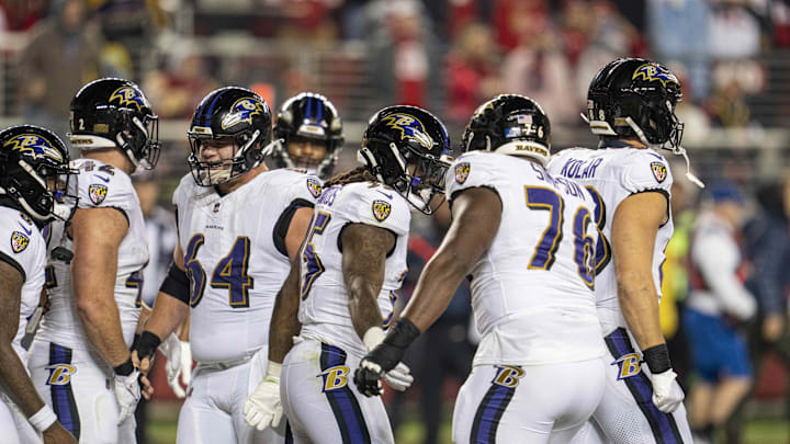 Dec 25, 2023; Santa Clara, California, USA; Baltimore Ravens running back Gus Edwards (35) celebrates with guard John Simpson (76) and teammates after the touchdown during the second quarter against the San Francisco 49ers at Levi's Stadium. Mandatory Credit: Neville E. Guard-Imagn Images