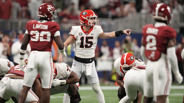 Dec 2, 2023; Atlanta, GA, USA; Georgia Bulldogs quarterback Carson Beck (15) during the first half against the Alabama Crimson Tide in the SEC Championship game at Mercedes-Benz Stadium. Mandatory Credit: Dale Zanine-Imagn Images