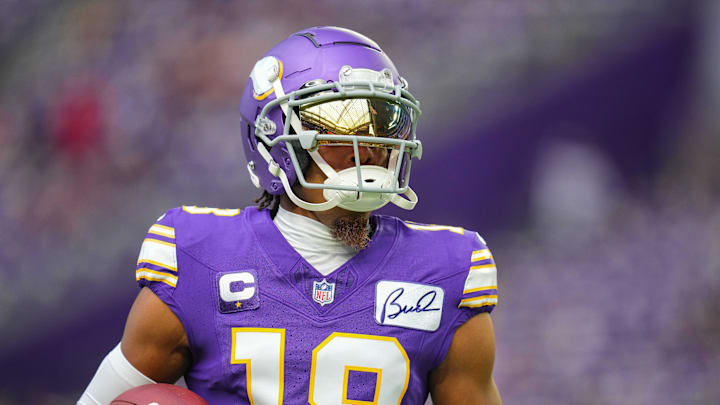 Sep 10, 2023; Minneapolis, Minnesota, USA; Minnesota Vikings wide receiver Justin Jefferson (18) warms up before the game against the Tampa Bay Buccaneers at U.S. Bank Stadium. Mandatory Credit: Brad Rempel-Imagn Images