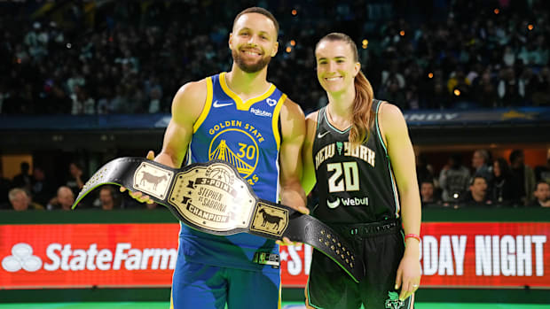 Golden State Warriors guard Stephen Curry and New York Liberty guard Sabrina Ionescu after the Stephen vs Sabrina three-point