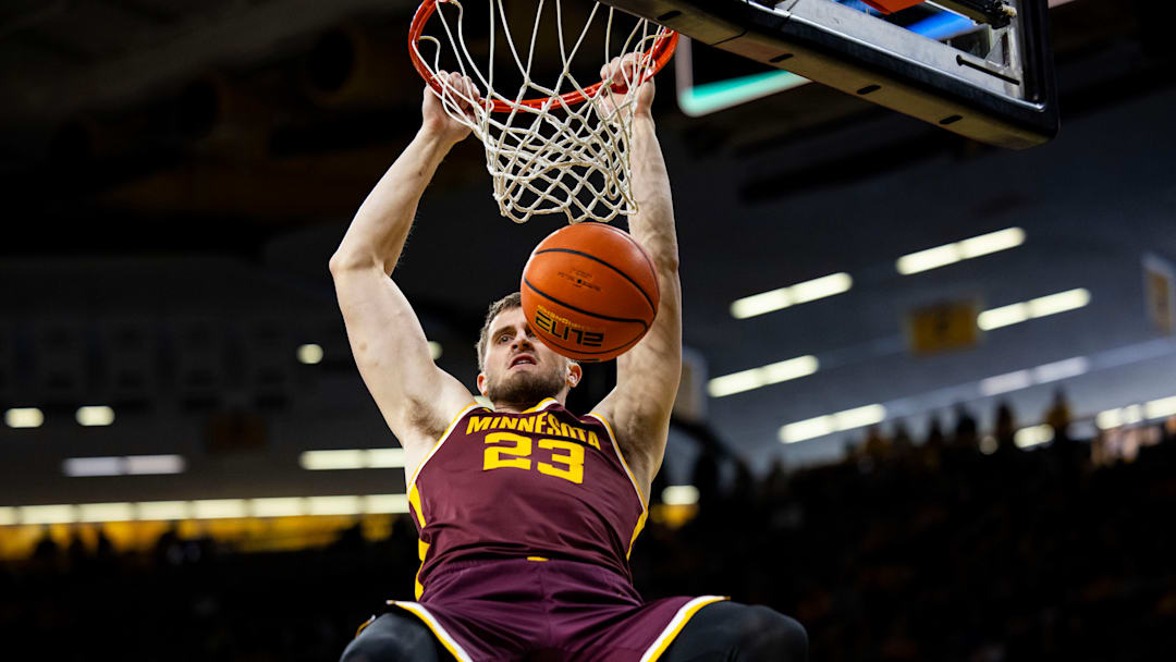Parker Fox dunking in Carver-Hawkeye Arena