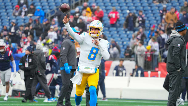 Los Angeles Chargers quarterback Taylor Heinicke (8) warms up prior to the game against the New England Patriots