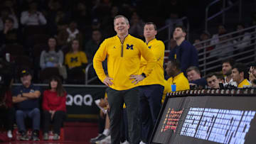 Jan 4, 2025; Los Angeles, California, USA; Michigan Wolverines head coach Dusty May reacts in the first half against the Southern California Trojans at Galen Center. Mandatory Credit: Kirby Lee-Imagn Images