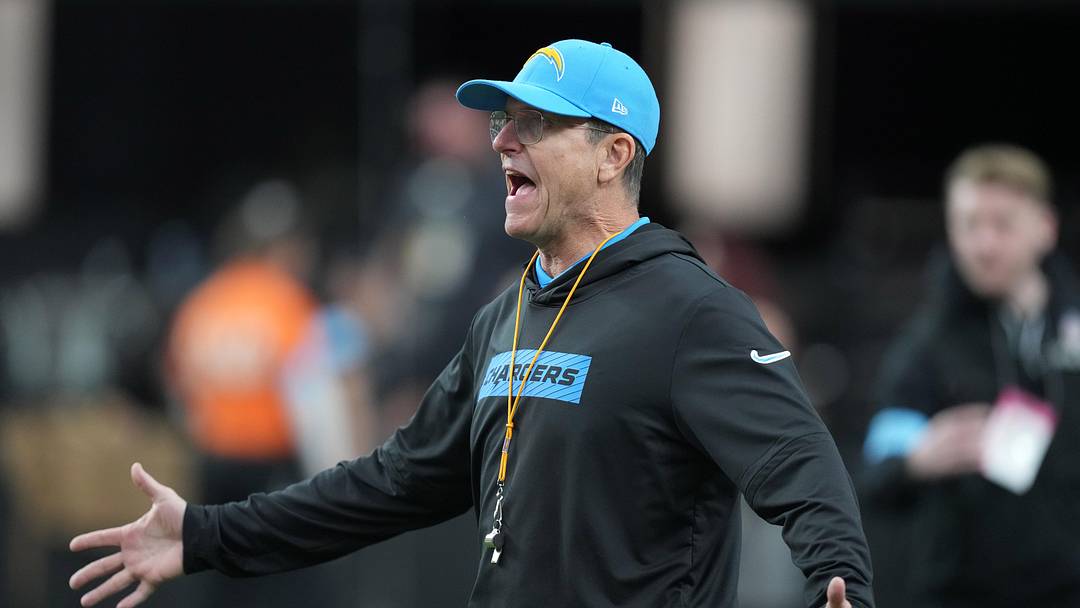 Jan 5, 2025; Paradise, Nevada, USA; Los Angeles Chargers coach Jim Harbaugh reacts against the Las Vegas Raiders in the first half at Allegiant Stadium. Mandatory Credit: Kirby Lee-Imagn Images