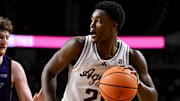 Dec 28, 2024; College Station, Texas, USA; Texas A&M Aggies forward Pharrel Payne (21) controls the ball during the first half against the Abilene Christian Wildcats at Reed Arena. Mandatory Credit: Maria Lysaker-Imagn Images 