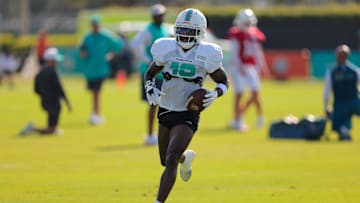 Jul 29, 2025; Miami Gardens, FL, USA; Miami Dolphins wide receiver Tyreek Hill (10) runs with the football during training camp at Baptist Health Training Complex. Mandatory Credit: Sam Navarro-Imagn Images