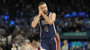 Aug 10, 2024; Paris, France; United States shooting guard Stephen Curry (4) reacts in the second half against France in the men's basketball gold medal game during the Paris 2024 Olympic Summer Games at Accor Arena. 