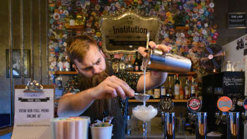 Bartender pouring a cocktail