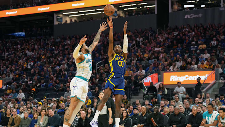Feb 23, 2024; San Francisco, California, USA; Golden State Warriors forward Jonathan Kuminga (00) shoots against Charlotte Hornets forward Miles Bridges (0) during the second quarter at Chase Center. Mandatory Credit: Darren Yamashita-Imagn Images Feb 23, 2024; San Francisco, California, USA; Golden State Warriors forward Jonathan Kuminga (00) shoots against Charlotte Hornets forward Miles Bridges (0) during the second quarter at Chase Center. Mandatory Credit: Darren Yamashita-Imagn Images