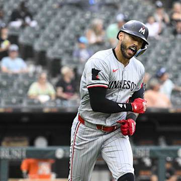 Minnesota Twins shortstop Carlos Correa (4) celebrates after hitting a home run against the Chicago White Sox during the sixth inning at Guaranteed Rate Field in Chicago on July 10, 2024.