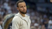Golden State Warriors guard Stephen Curry (30) looks on against the Minnesota Timberwolves in the second half during game five of the second round for the 2025 NBA Playoffs at Target Center.