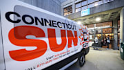 A truck with a Connecticut Sun logo is seen at Massasoit Community College in Brockton, Mass.