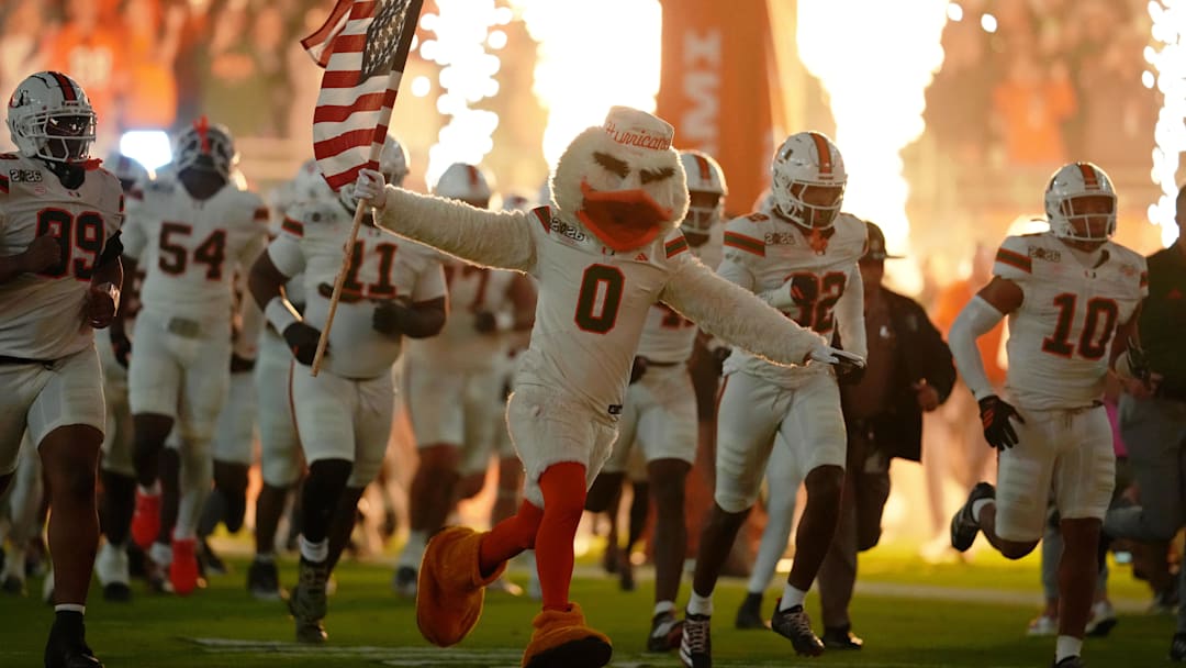 Jan 19, 2026; Miami Gardens, FL, USA; Miami Hurricanes mascot Sebastian the Ibis leads the team onto the field before the CFP National Championship college football game between the Indiana Hoosiers and the Miami Hurricanes at Hard Rock Stadium. Mandatory Credit: Kirby Lee-Imagn Images