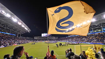 Sep 23, 2023; Philadelphia, Pennsylvania, USA; Fans wave a flag before the game between Los Angeles