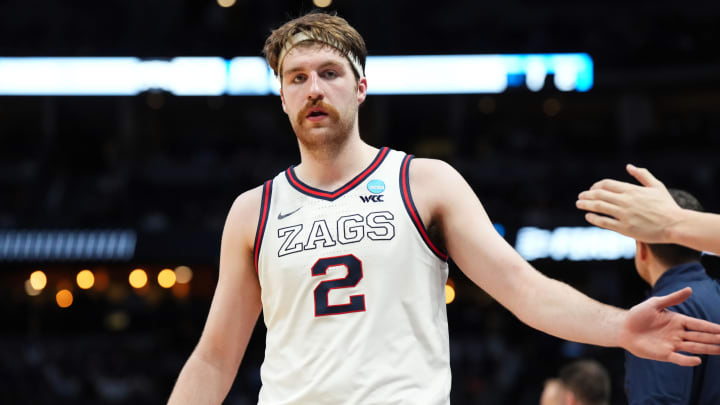 Gonzaga Bulldogs forward Drew Timme (2) slaps hands with the bench in the second half against the TCU Horned Frogs at Ball Arena in the 2023 NCAA Tournament.