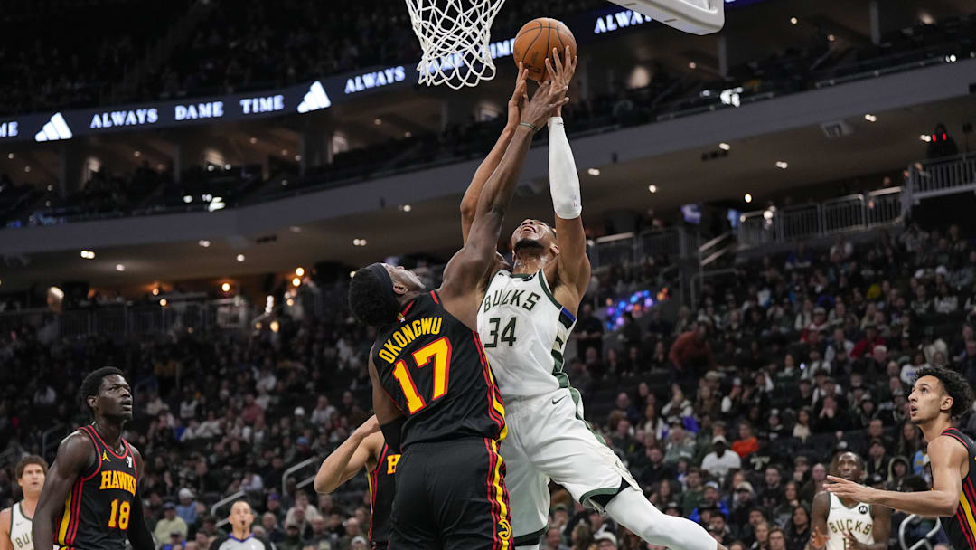 Mar 30, 2025; Milwaukee, Wisconsin, USA; Milwaukee Bucks forward Giannis Antetokounmpo (34) shoots against Atlanta Hawks center Onyeka Okongwu (17) during the first quarter at Fiserv Forum. Mandatory Credit: Jeff Hanisch-Imagn Images Mar 30, 2025; Milwaukee, Wisconsin, USA; Milwaukee Bucks forward Giannis Antetokounmpo (34) shoots against Atlanta Hawks center Onyeka Okongwu (17) during the first quarter at Fiserv Forum. Mandatory Credit: Jeff Hanisch-Imagn Images