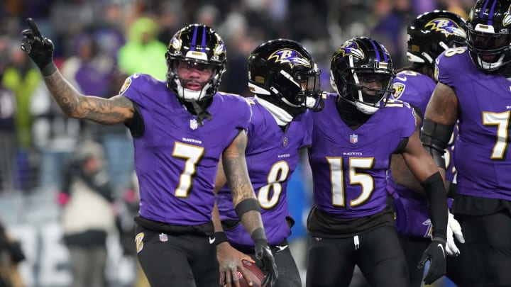 Jan 20, 2024; Baltimore, MD, USA; Baltimore Ravens quarterback Lamar Jackson (8) celebrates with wide receiver Rashod Bateman (7) and wide receiver Nelson Agholor (15) after scoring a touchdown against the Houston Texans during the third quarter of a 2024 AFC divisional round game at M&T Bank Stadium. Mandatory Credit: Mitch Stringer-USA TODAY Sports