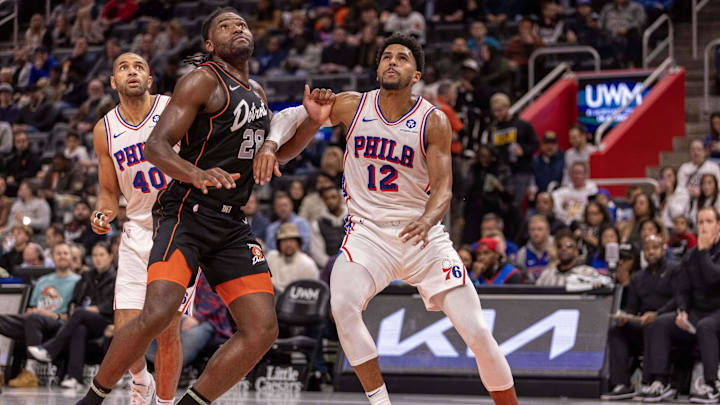 Nov 10, 2023; Detroit, Michigan, USA; Detroit Pistons center Isaiah Stewart (28) battles for position with Philadelphia 76ers forward Tobias Harris (12) during the second half at Little Caesars Arena. Mandatory Credit: David Reginek-Imagn Images