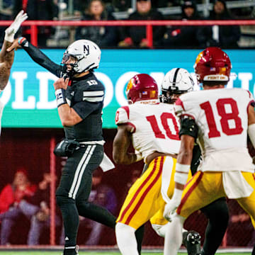 Nov 1, 2025; Lincoln, Nebraska, USA; Nebraska Cornhuskers quarterback Dylan Raiola (15) passes against Southern California Trojans defensive tackle Devan Thompkins (8) during the second quarter at Memorial Stadium. 