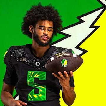 Oregon Ducks uniforms nike phil knight Grateful Dead Dante Moore tie-dye Autzen Stadium Wisconsin Badgers Jerry Garcia Dan Lanning recruiting nil Oregon Ducks uniforms nike phil knight Grateful Dead Dante Moore tie-dye Autzen Stadium Wisconsin Badgers Jerry Garcia Dan Lanning recruiting nil