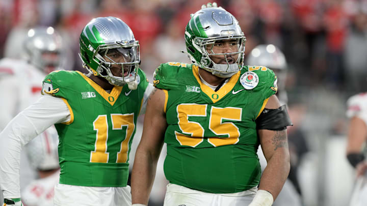 Jan 1, 2025; Pasadena, CA, USA; Oregon Ducks defensive lineman Derrick Harmon (55) reacts in the second half against the Ohio State Buckeyes in the 2025 Rose Bowl college football quarterfinal game at Rose Bowl Stadium. Mandatory Credit: Kirby Lee-Imagn Images Jan 1, 2025; Pasadena, CA, USA; Oregon Ducks defensive lineman Derrick Harmon (55) reacts in the second half against the Ohio State Buckeyes in the 2025 Rose Bowl college football quarterfinal game at Rose Bowl Stadium. Mandatory Credit: Kirby Lee-Imagn Images