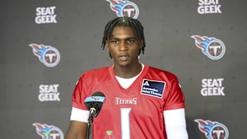 May 10, 2025; Nashville, TN, USA;  Tennessee Titans quarterback Cam Ward (1) talks with reporters after his first day of rookie mini camp  at Saint Thomas Sports Park. Mandatory Credit: Steve Roberts-Imagn Images